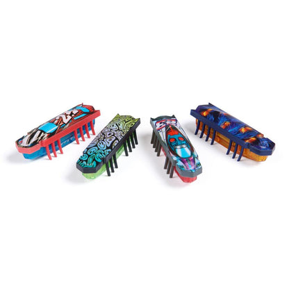 Two HEXBUG Flash Nano robotic bugs racing each other across a smooth floor in a head-to-head micro bug race