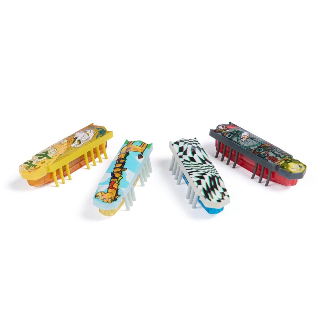 HEXBUG Flash Nano running through a homemade obstacle course built from books, rulers and small cardboard boxes