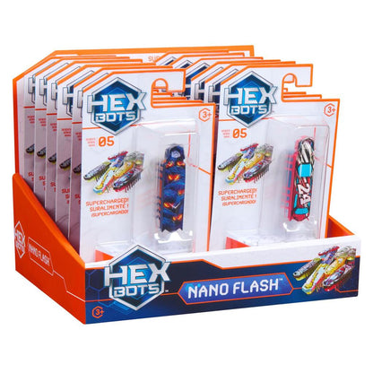 Child watching a HEXBUG Flash Nano robotic bug scurry across a tabletop and right itself after flipping over