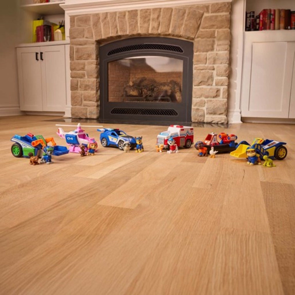 Child launching the PAW Patrol Zuma Rescue Hovercraft across the floor using its pullback motor
