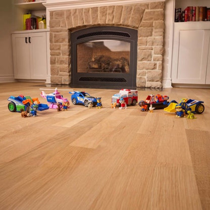 Child launching the PAW Patrol Zuma Rescue Hovercraft across the floor using its pullback motor