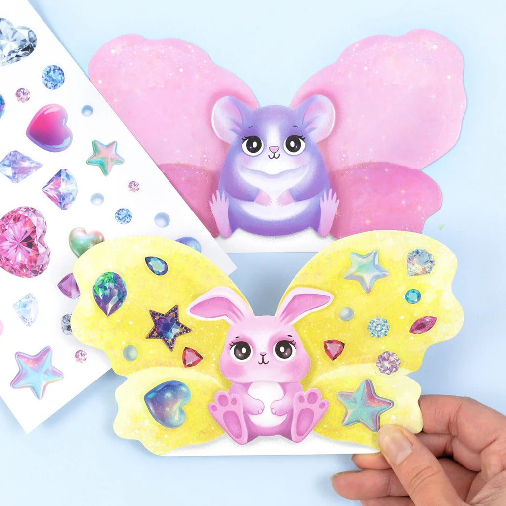 Sticker sheets of florals, patterns and small details used to decorate each set of wings