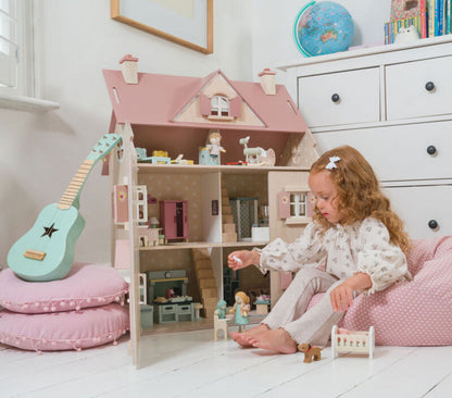Tender Leaf Alouette wooden dolls house shown front-on with the shutters closed