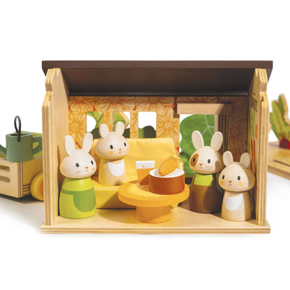 close-up of the wooden crate pram with toddler bunnies Twix and Twinkle inside it