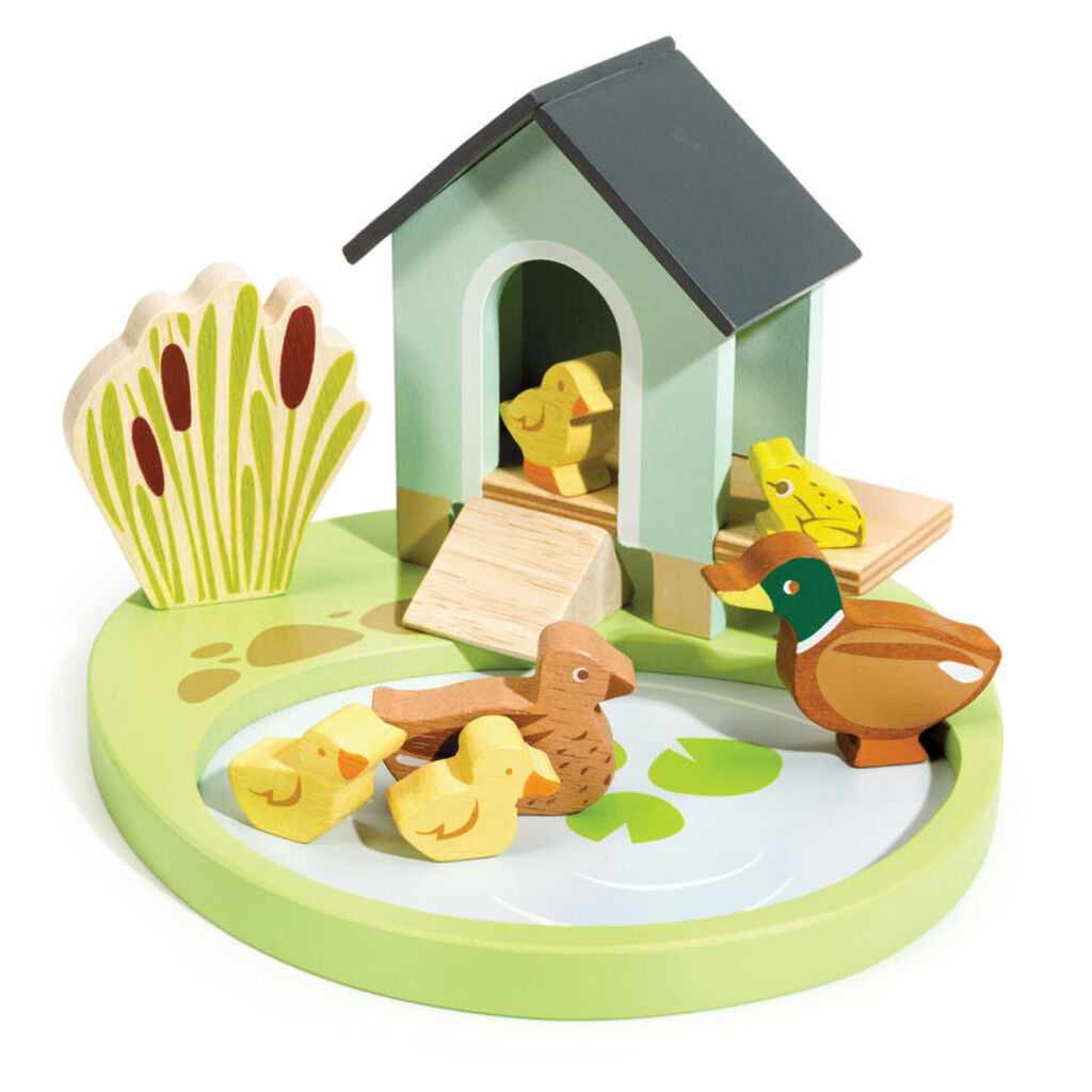 close-up of the painted wooden frog and reeds from the Tender Leaf duck pond set