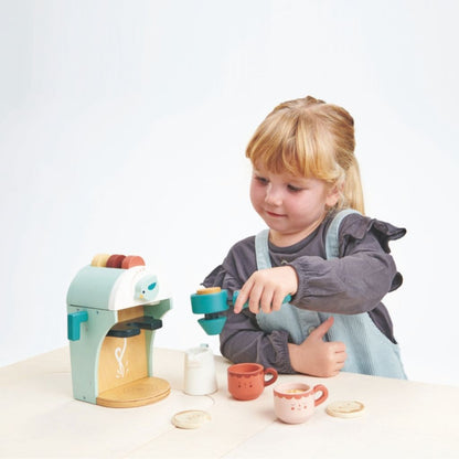 Close-up of the illustrated details on the Tender Leaf Toys wooden Babyccino coffee machine