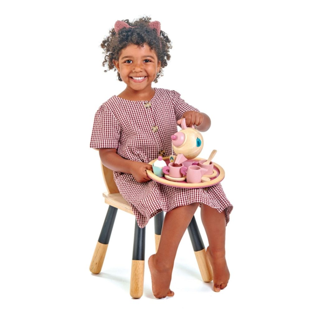 Wooden cake and treats from the Tender Leaf Toys Birdie tea set ready to serve to guests