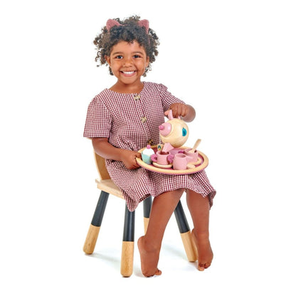 Wooden cake and treats from the Tender Leaf Toys Birdie tea set ready to serve to guests