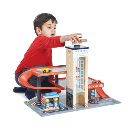 Car ramp on the Tender Leaf Toys Blue Bird wooden garage for rolling vehicles down