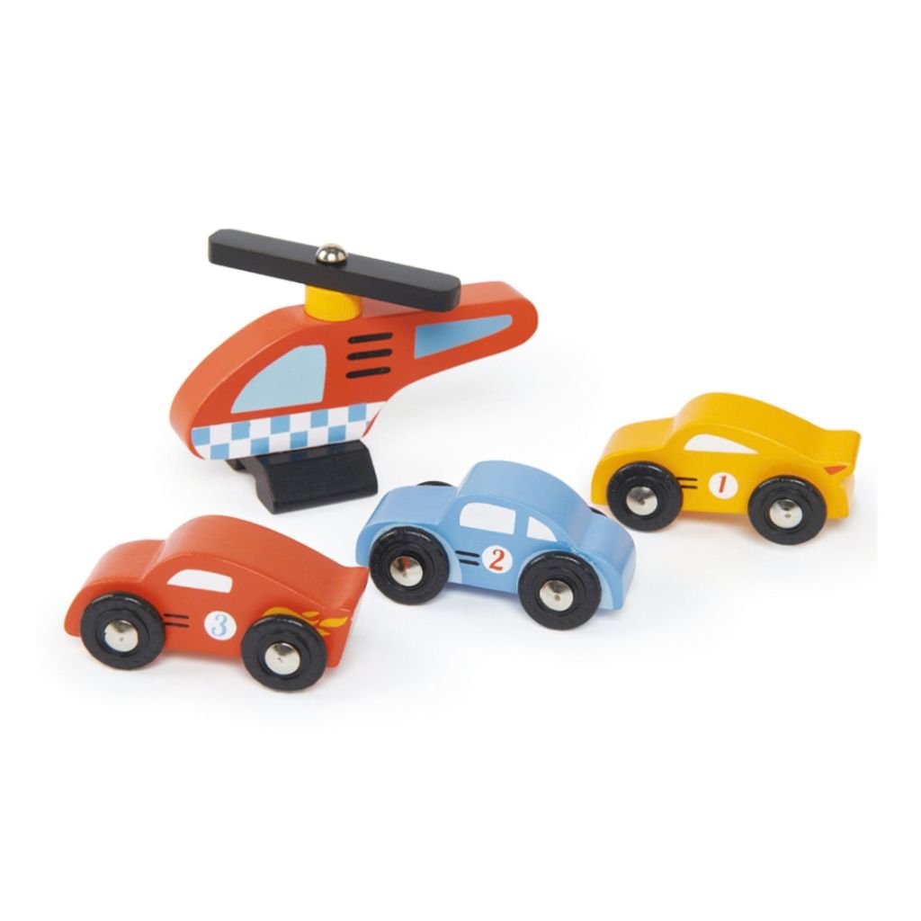 Close-up of the illustrated signs on the Tender Leaf Toys Blue Bird service station