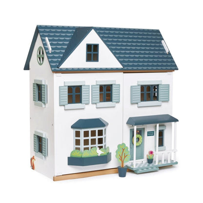 Tender Leaf Toys Dovetail wooden doll house with two floors, attic, opening shutters and a front porch