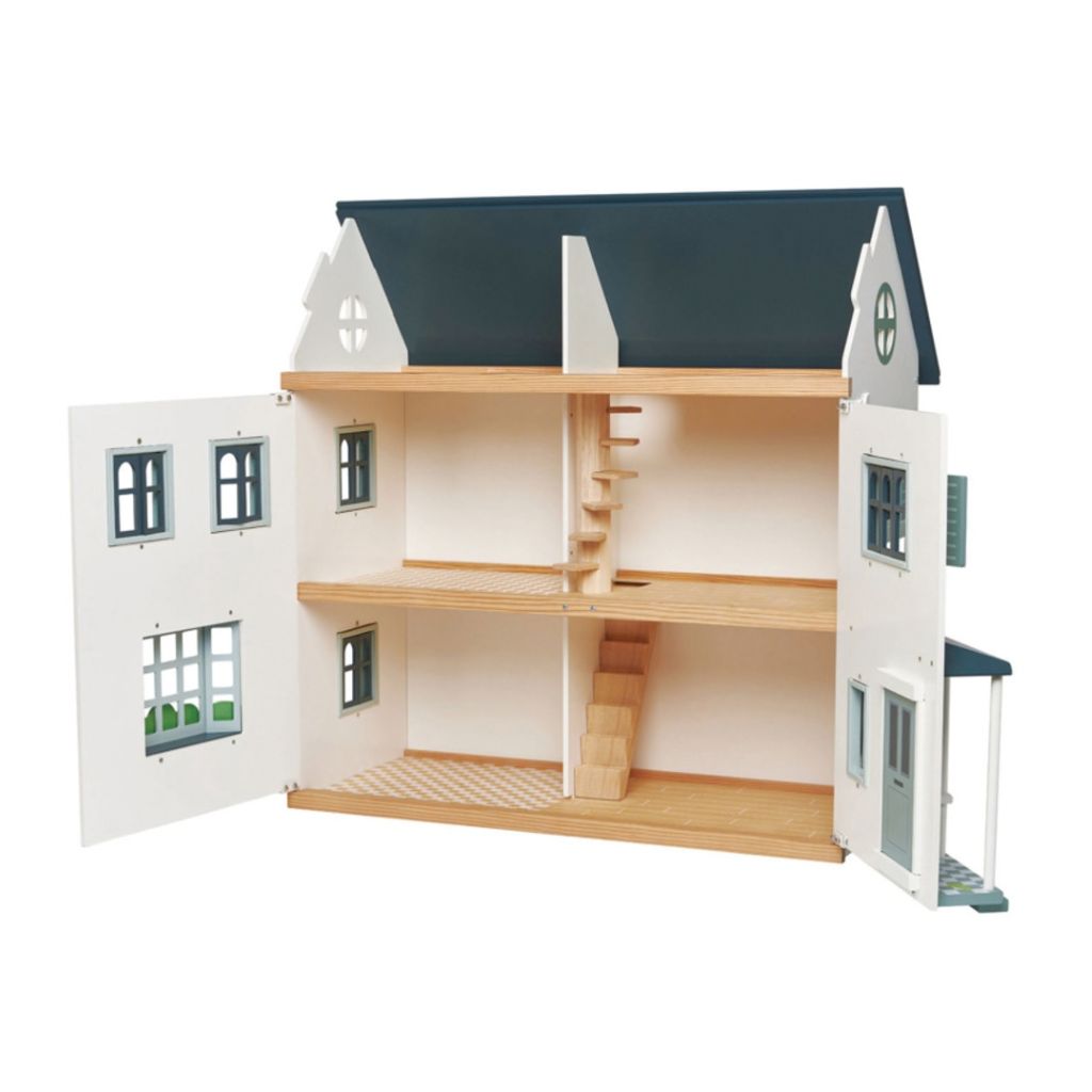 Side view of the Tender Leaf Toys Dovetail doll house showing its depth and painted exterior details