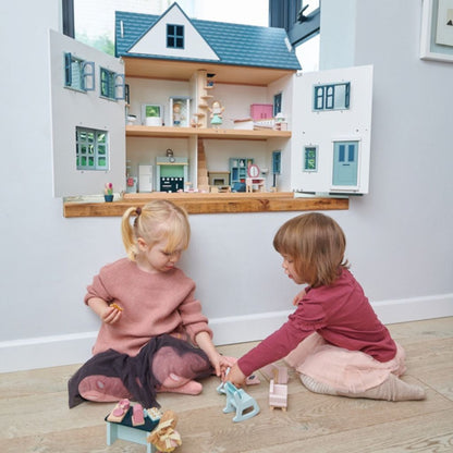 Front porch with steps leading to the working front door on the Tender Leaf Dovetail doll house
