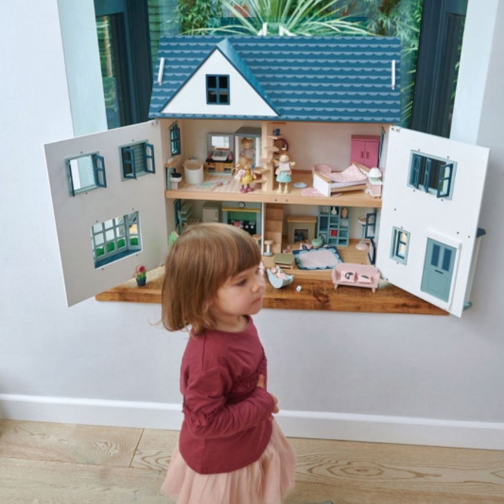 Close-up of the printed wooden floors inside the Tender Leaf Toys Dovetail dolls house