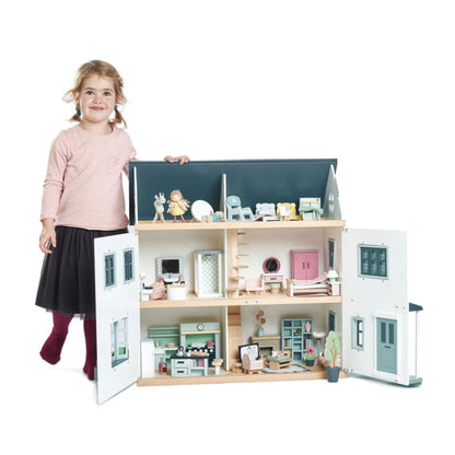 Open back of the Tender Leaf Toys Dovetail dolls house revealing six rooms with printed plywood floors