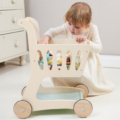 Fabric storage basket on the Tender Leaf Toys shopping cart filled with wooden play food