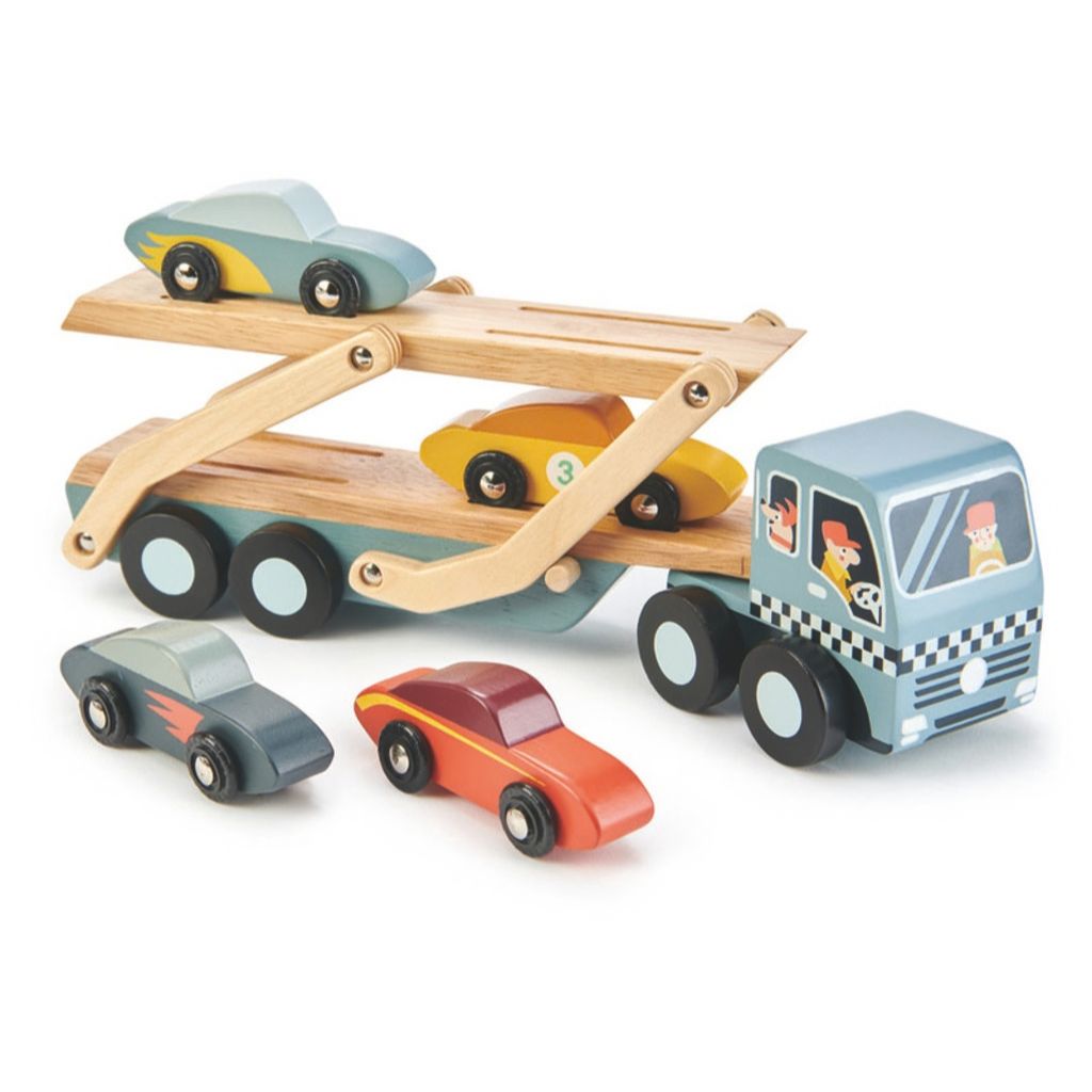 Side view of the Tender Leaf Toys wooden car transporter showing its two-level trailer