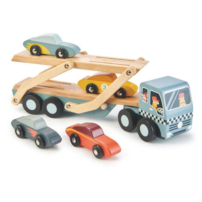 Side view of the Tender Leaf Toys wooden car transporter showing its two-level trailer