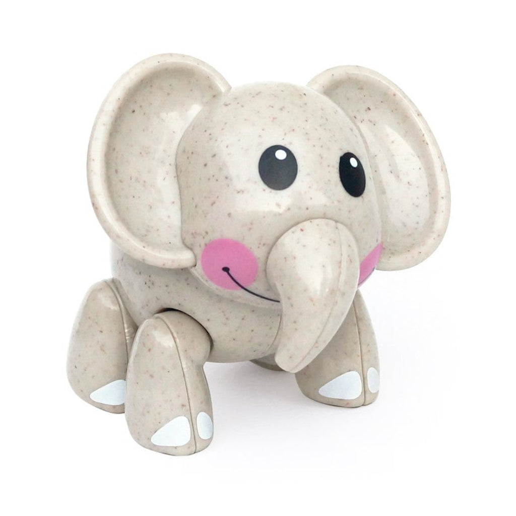 Cute grey speckled elephant toy figure with large ears, curved trunk, pink cheeks and movable legs, shown on a white background.