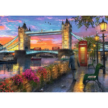 Completed Tower Bridge at Sunset jigsaw with twin Gothic towers and sunset light reflecting off the Thames