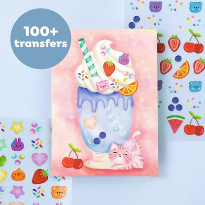 Child rubbing a transfer onto a background card with the included tool at a table
