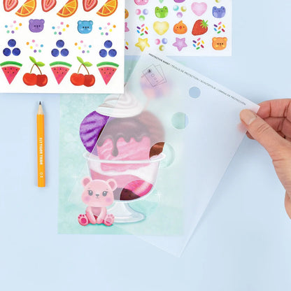 The transfer sheet peeled back to reveal the full-colour image left behind on the scene