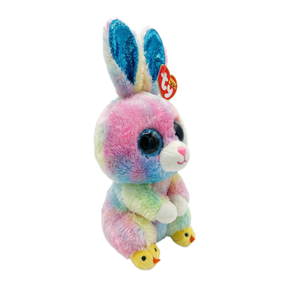 Side view of the Twitches the Rabbit Ty Beanie Boo photographed with its red Ty Heart swing tag visible