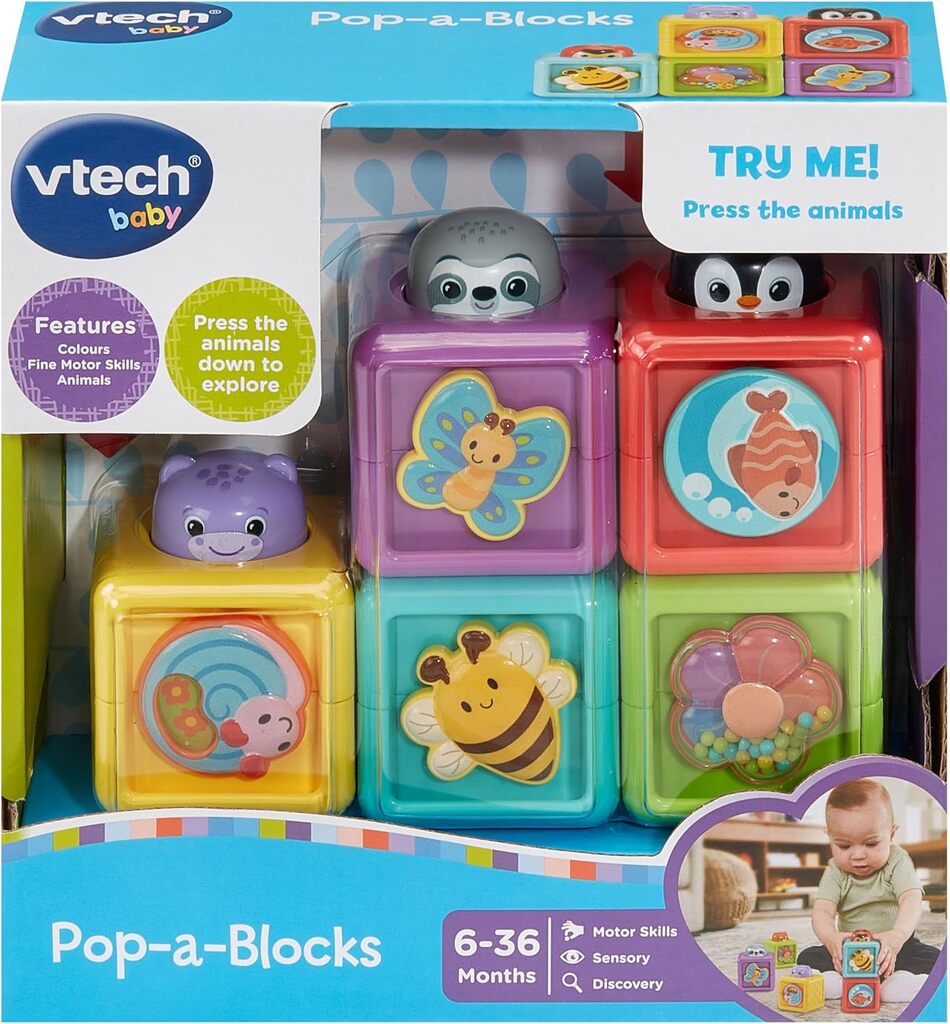 Close-up of a single Pop-a-Block showing the press button and the character that pops up