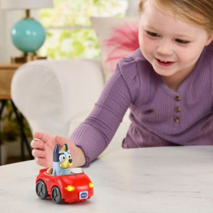VTech Bluey Escape Convertible toy car with flashing headlights music and driving sounds with child playing
