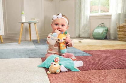 Close-up of a Forest Pals rattle character showing the crinkle ears and textured fabric tag