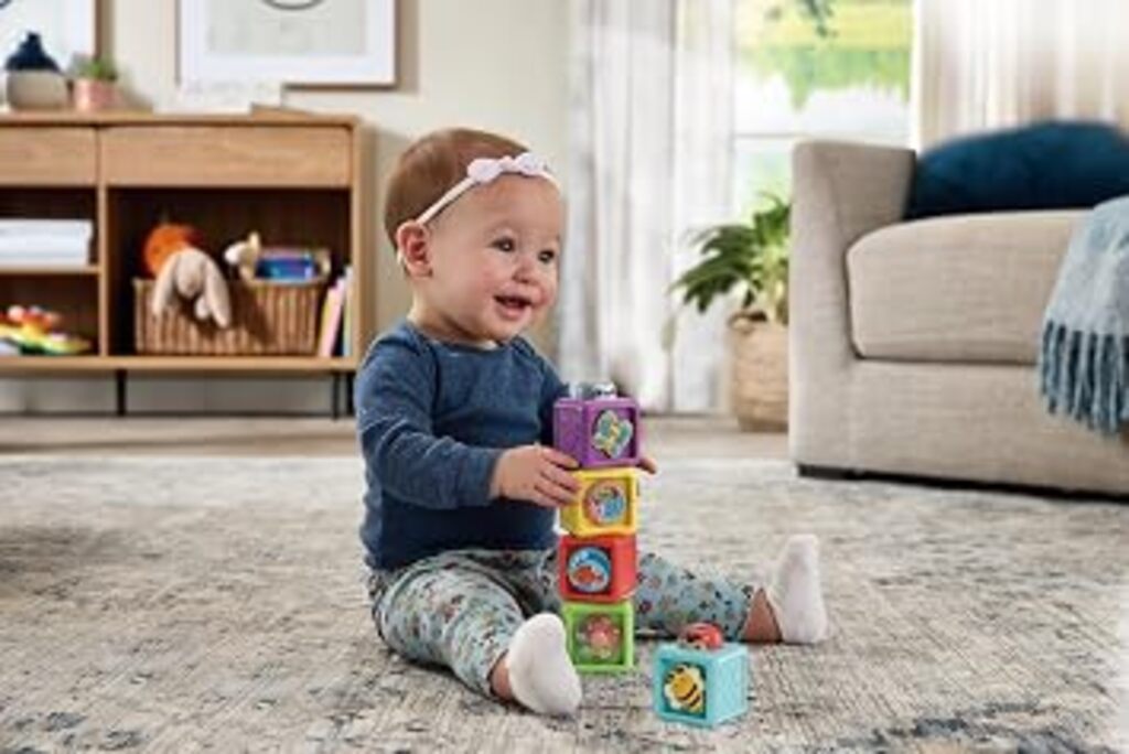 All five Pop-a-Blocks stacked into a tower showing the height and relative block size