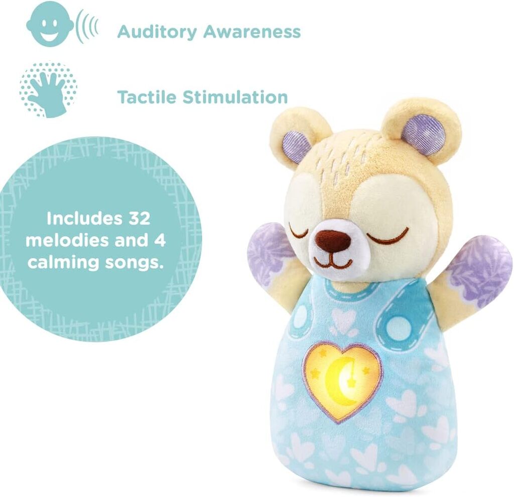 Close-up of the Soothing Bear face and ears showing the embroidered features and soft plush fabric
