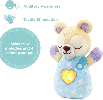 Close-up of the Soothing Bear face and ears showing the embroidered features and soft plush fabric