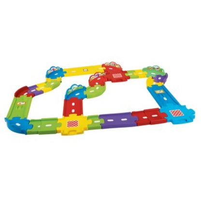 VTech Toot-Toot Drivers Deluxe Track Set assembled into a 30-piece layout with ramps and bends