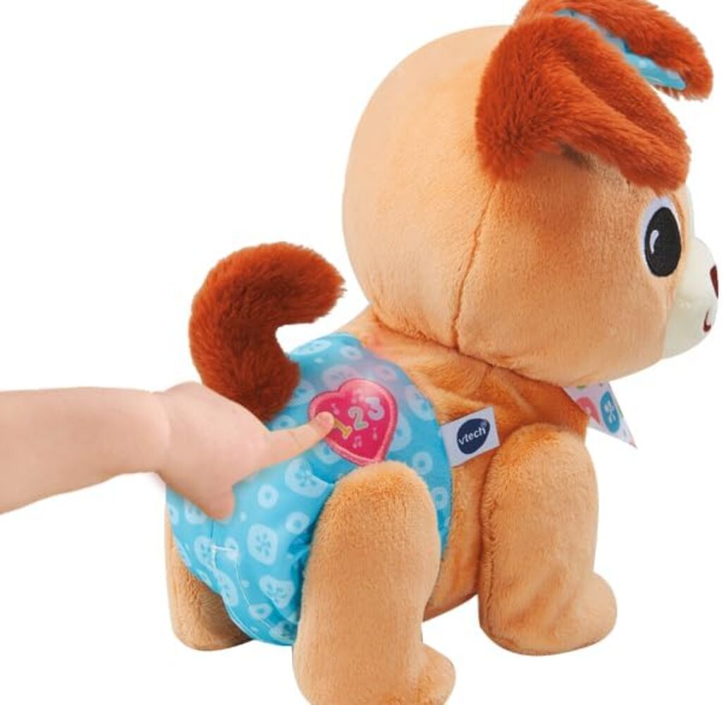 Close-up of the Walk & Wag Puppy face, collar buttons and tail showing the soft plush texture