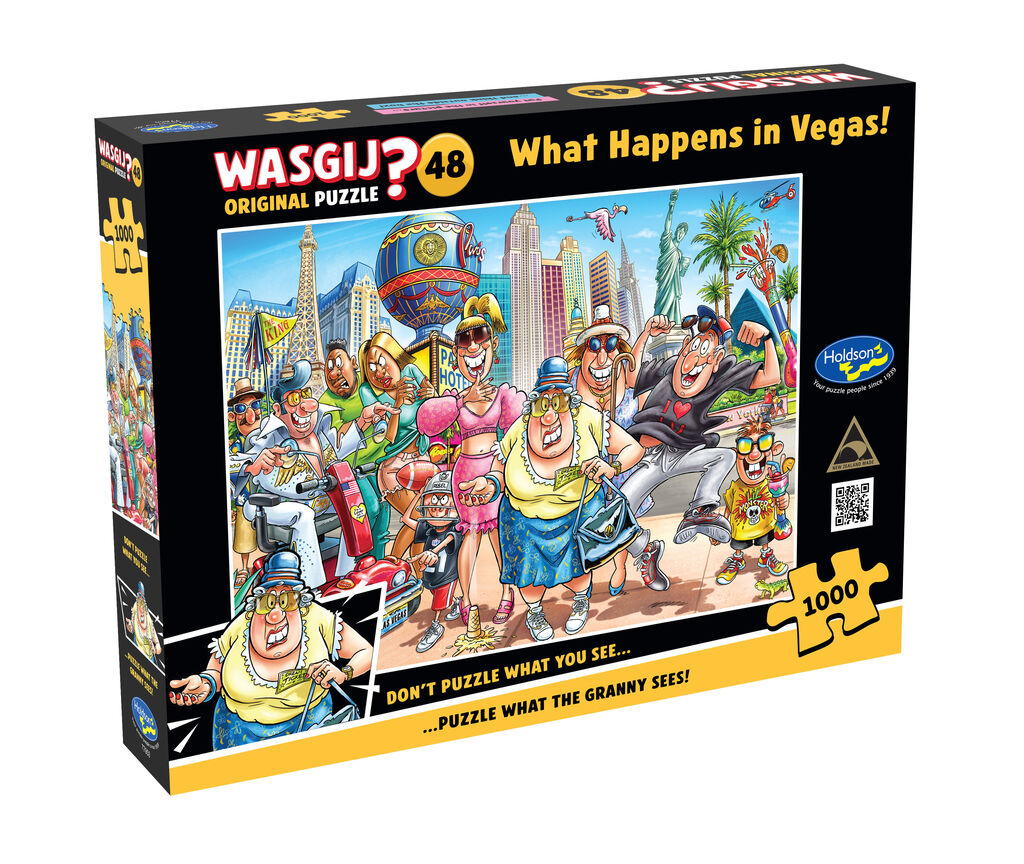 What Happens In Vegas Wasgij artwork with a Las Vegas Strip crowd reacting to an off-frame scene