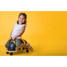 Side view of the Wheely Bug large bee showing its seat height and long padded body