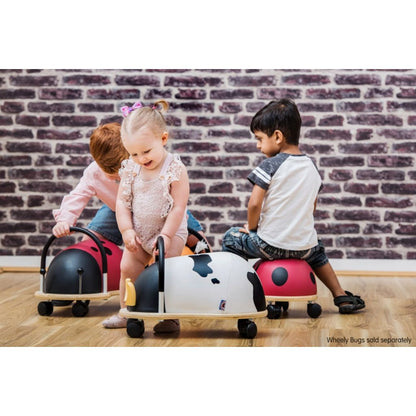 Multi-directional castor wheels under the Wheely Bug small ladybug for gliding in every direction